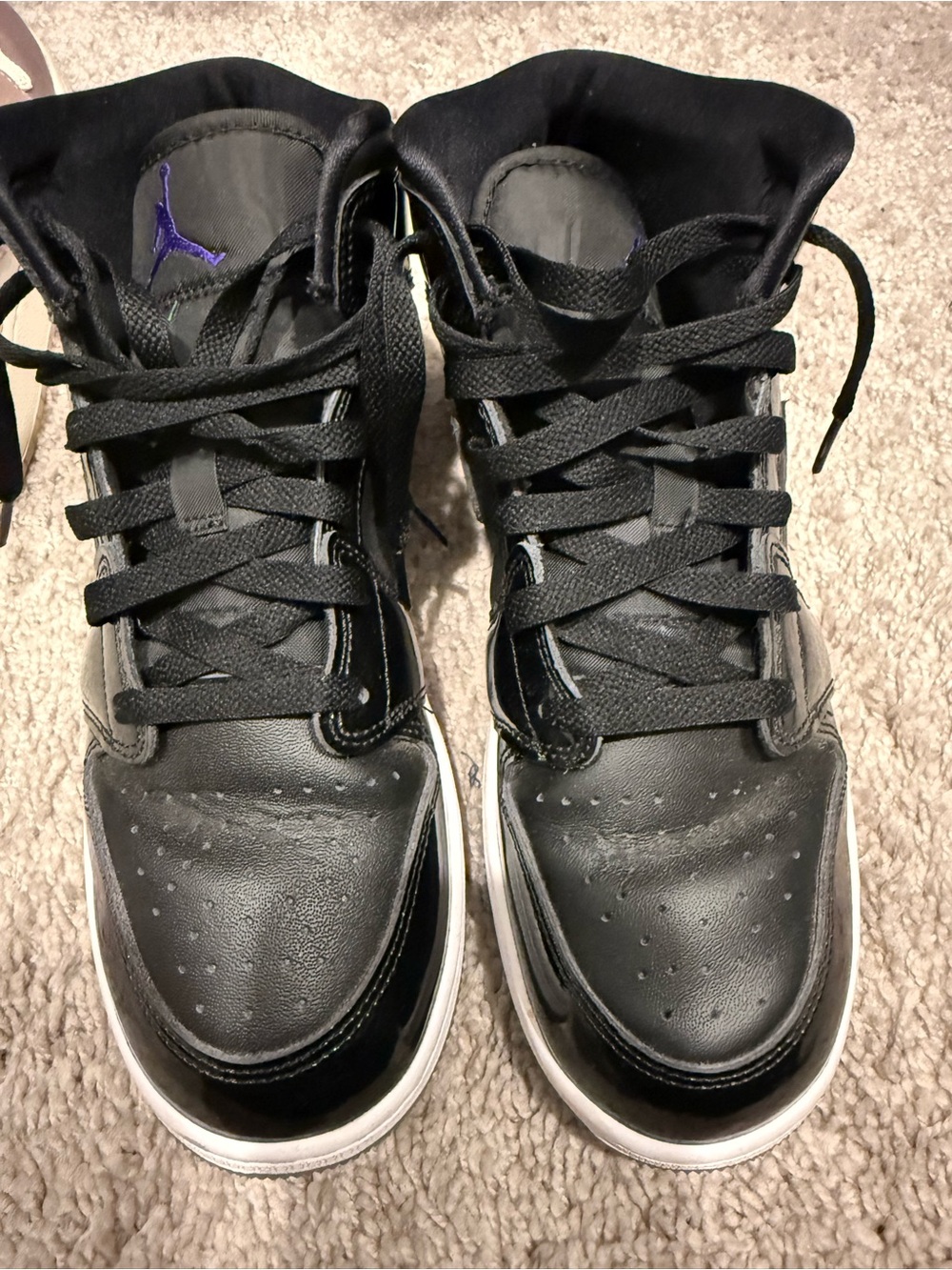 Nike Black High-Top Sneakers with Purple Logo